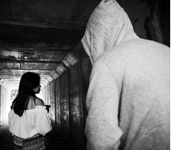Man following woman